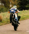 rg500_anon_wheelie.jpg (135471 bytes)