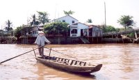 Mekong_Boat_Girl_s.jpg (8178 bytes)