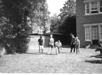 Playing 
ball in St Margaret's Road garden